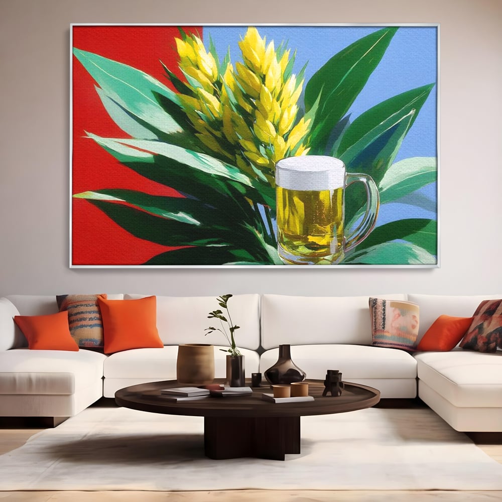 Tablou canvas cu tablou canvas cu halba de bere si frunze tropicale, in rama de aluminiu argintiu, pe perete intr-un living